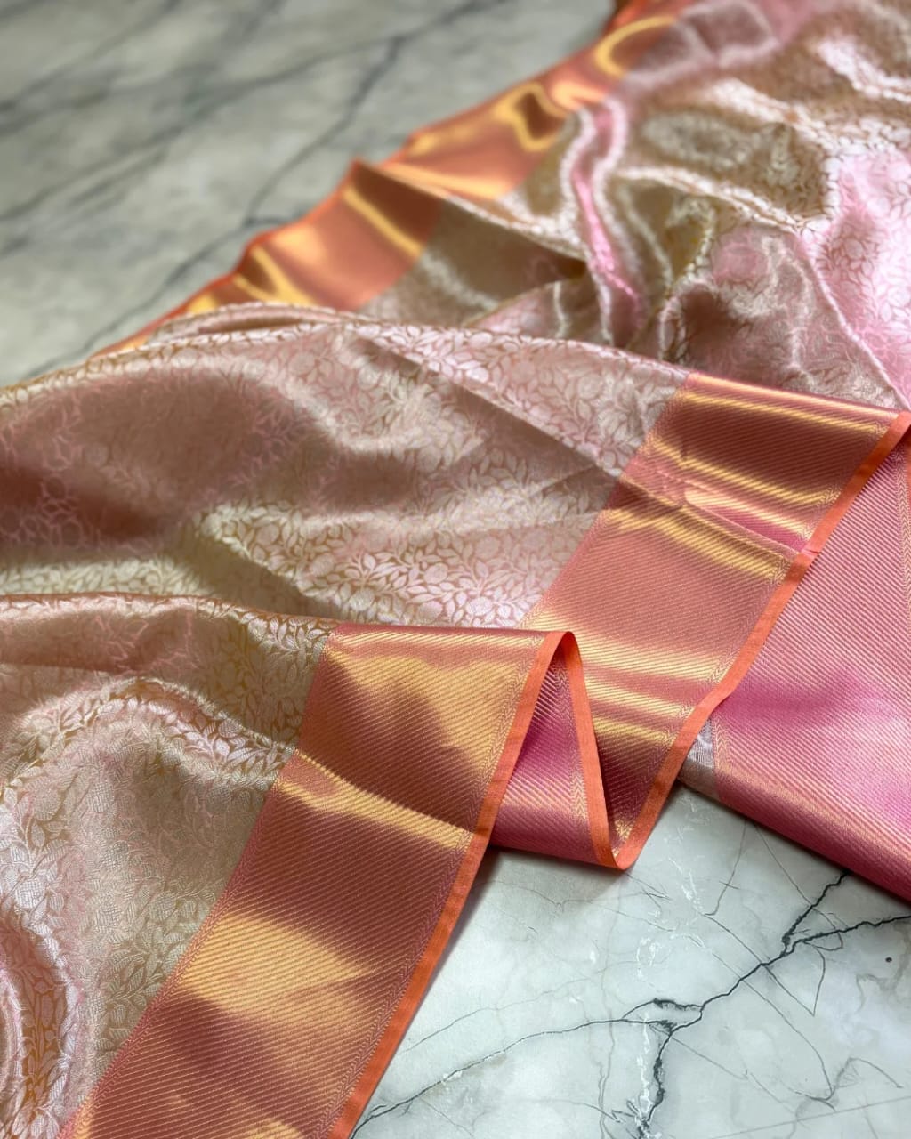 Sai Pallavi Peach Pink Tissue Silk Saree with Golden Zari Weaving