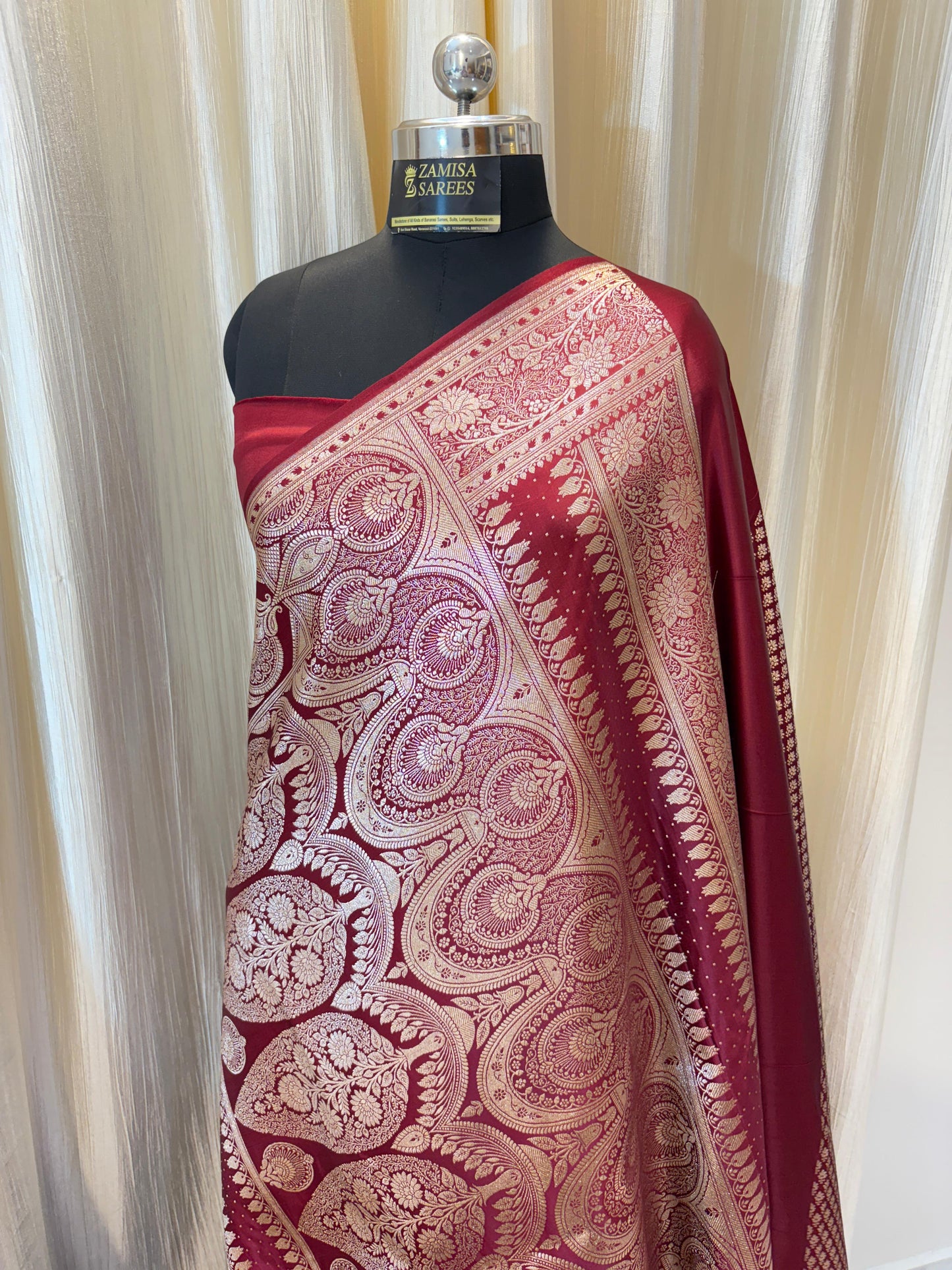 Maroon Banarasi Silk Saree with Intricate Golden Zari Work